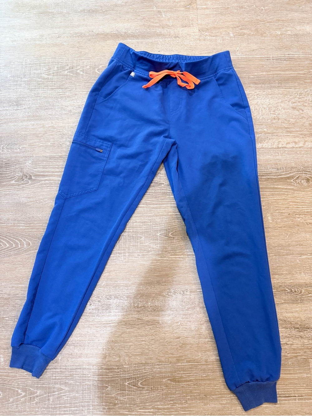 Figs women’s Bright Royal Blue Jogger Scrub Pants with Orange Drawstring